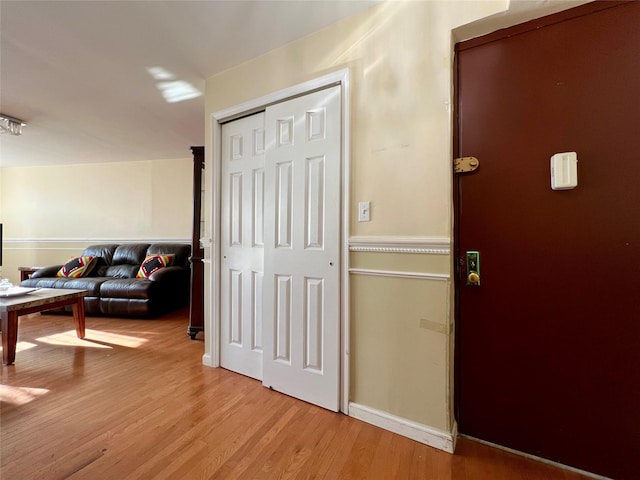 hallway with light wood-type flooring