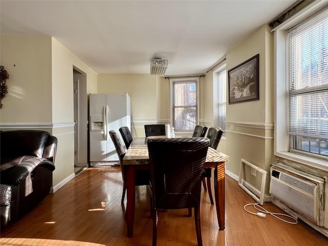 dining space featuring hardwood / wood-style floors