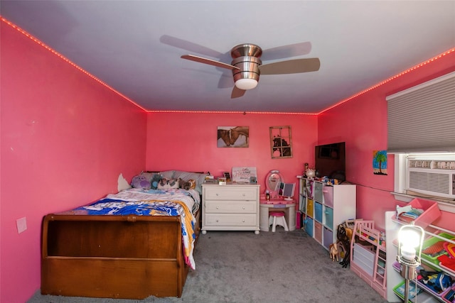 bedroom featuring carpet floors, cooling unit, and a ceiling fan