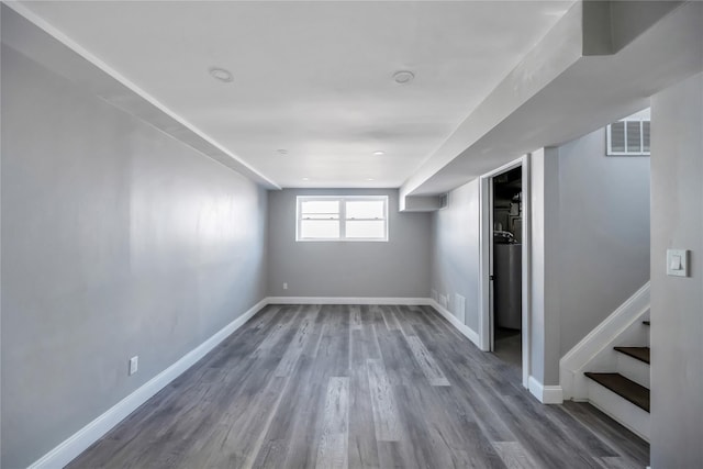 basement featuring hardwood / wood-style floors