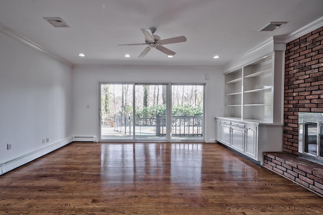 unfurnished living room with a brick fireplace, built in features, ornamental molding, and dark hardwood / wood-style floors