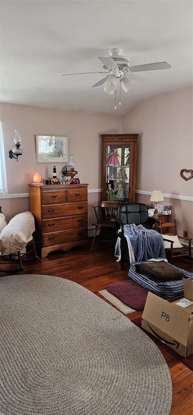 bedroom featuring dark wood-type flooring and ceiling fan