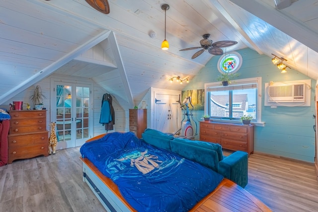 bedroom featuring lofted ceiling, hardwood / wood-style floors, wood ceiling, and a wall mounted AC