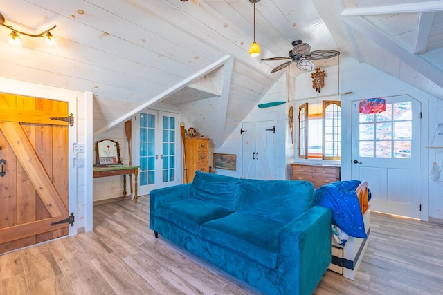 living room featuring lofted ceiling, wood ceiling, wood-type flooring, and french doors