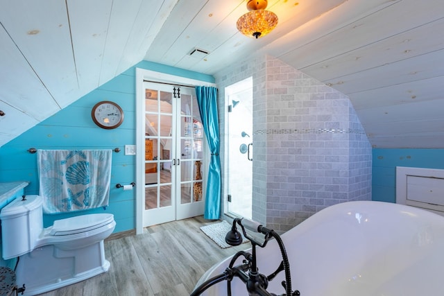 49 Bayview Ave W, Lindenhurst, NY 11757 - full bathroom with toilet, lofted ceiling, wooden ceiling, wood finished floors, and a soaking tub