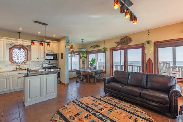 49 Bayview Ave W, Lindenhurst, NY 11757 - living room with tile patterned floors and recessed lighting