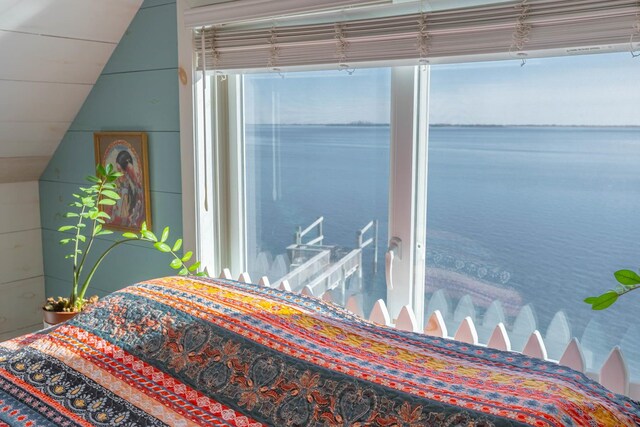 49 Bayview Ave W, Lindenhurst, NY 11757 - bedroom featuring a water view and lofted ceiling