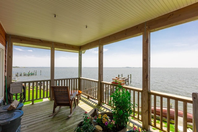 49 Bayview Ave W, Lindenhurst, NY 11757 - wooden deck featuring a water view, boat lift, and a boat dock