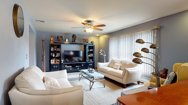 living room with ceiling fan