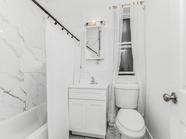 full bathroom featuring shower / tub combo with curtain, vanity, and toilet