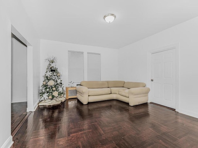 living room with dark parquet flooring