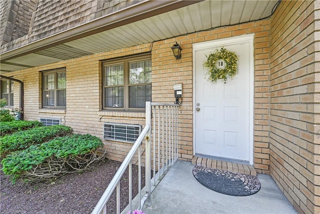 property entrance featuring a porch