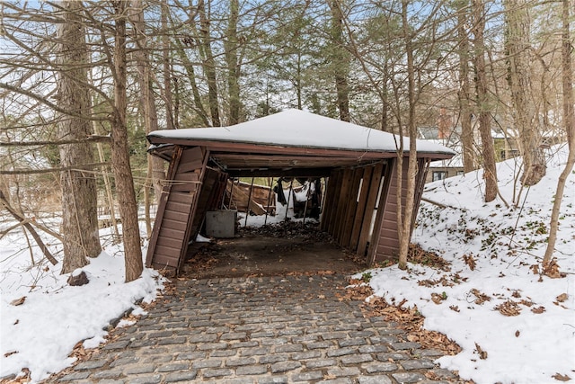 view of snow covered parking