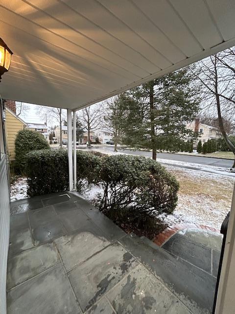 view of snow covered patio