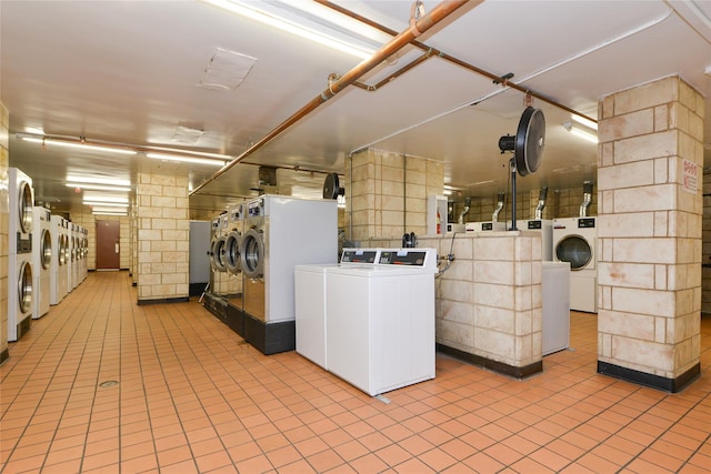 laundry area with washer and clothes dryer