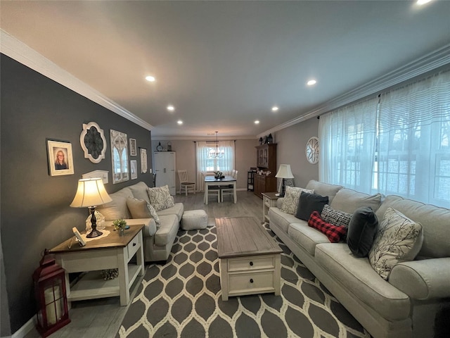 living room with crown molding and wood-type flooring