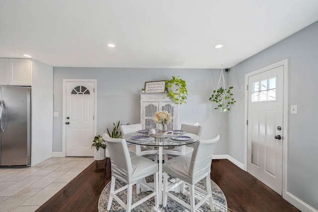 dining space featuring light hardwood / wood-style floors