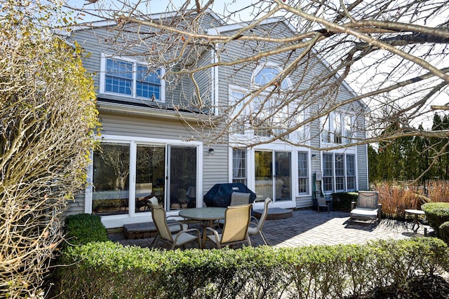 back of house featuring a patio