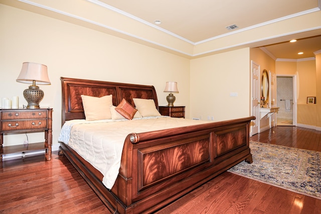 bedroom with crown molding and dark wood-type flooring