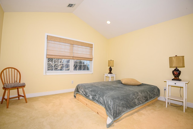 carpeted bedroom featuring vaulted ceiling