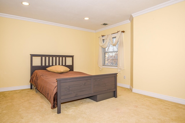 bedroom featuring ornamental molding and light colored carpet