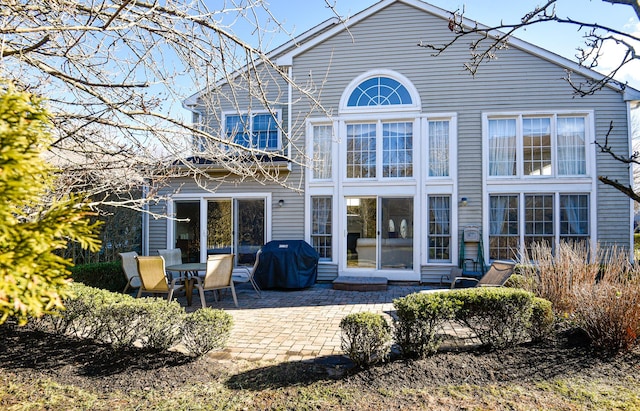 rear view of property with a patio