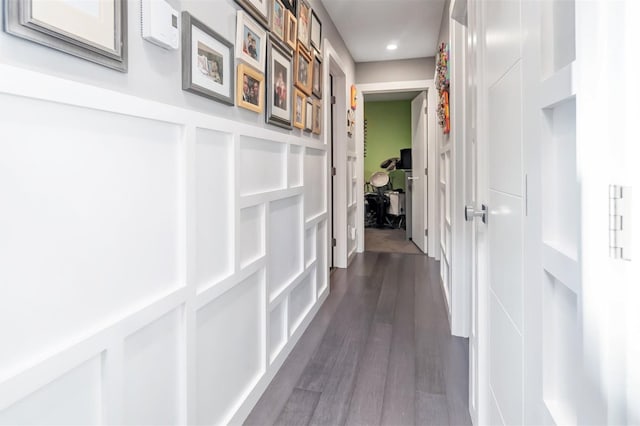 corridor featuring dark hardwood / wood-style flooring