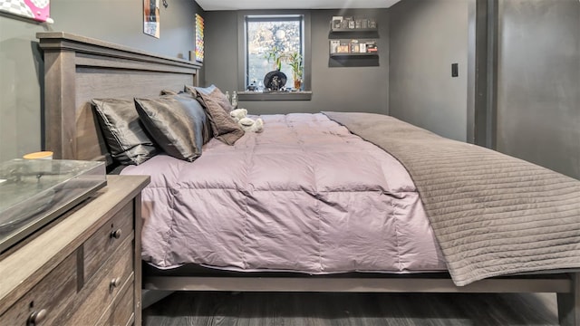 bedroom featuring dark hardwood / wood-style floors