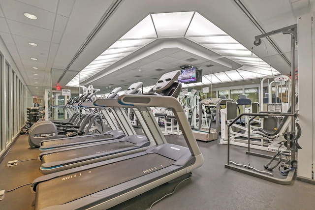 workout area with a paneled ceiling