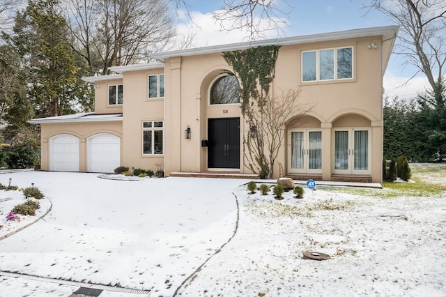 view of front of home with a garage