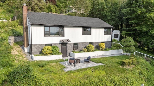 8 Fairway Pl, Cold Spring Harbor, NY 11724 - modern farmhouse featuring a patio, a chimney, and a shingled roof
