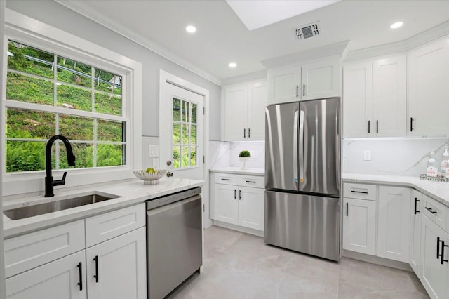 8 Fairway Pl, Cold Spring Harbor, NY 11724 - kitchen featuring appliances with stainless steel finishes, backsplash, white cabinetry, light stone counters, and recessed lighting