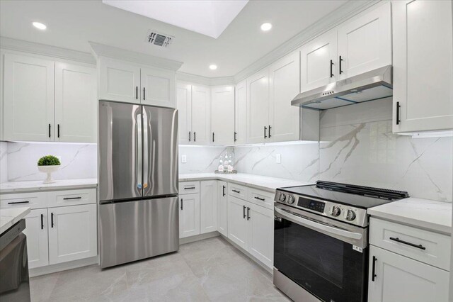 8 Fairway Pl, Cold Spring Harbor, NY 11724 - kitchen featuring appliances with stainless steel finishes, under cabinet range hood, white cabinets, recessed lighting, and backsplash