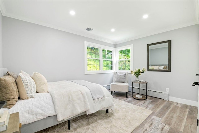 8 Fairway Pl, Cold Spring Harbor, NY 11724 - bedroom with baseboard heating, ornamental molding, wood finished floors, and recessed lighting