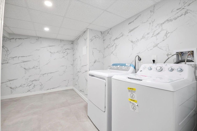 8 Fairway Pl, Cold Spring Harbor, NY 11724 - laundry area with recessed lighting, washer and dryer, and stone wall