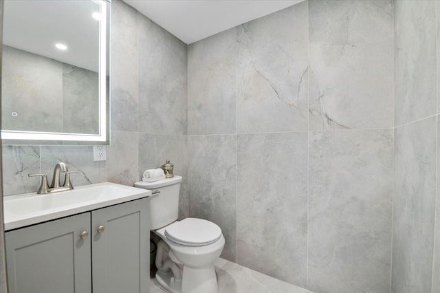 8 Fairway Pl, Cold Spring Harbor, NY 11724 - bathroom featuring vanity and tile walls