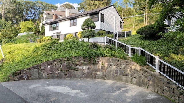 8 Fairway Pl, Cold Spring Harbor, NY 11724 - view of home's exterior with a chimney