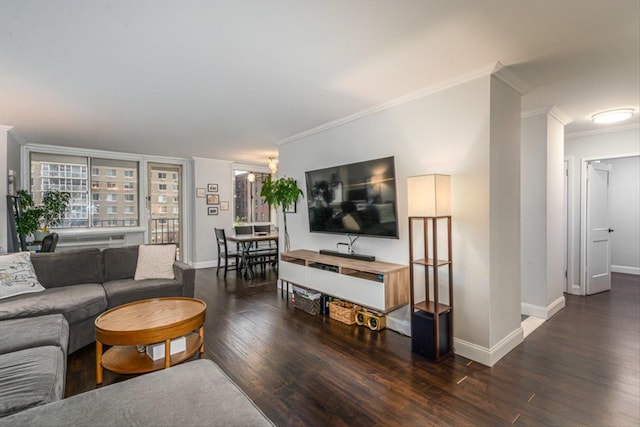 living room featuring dark hardwood / wood-style flooring and crown molding