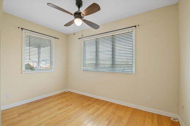 unfurnished room featuring ceiling fan and light hardwood / wood-style floors