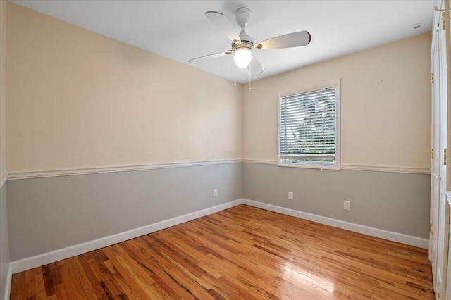 spare room with ceiling fan and light hardwood / wood-style flooring