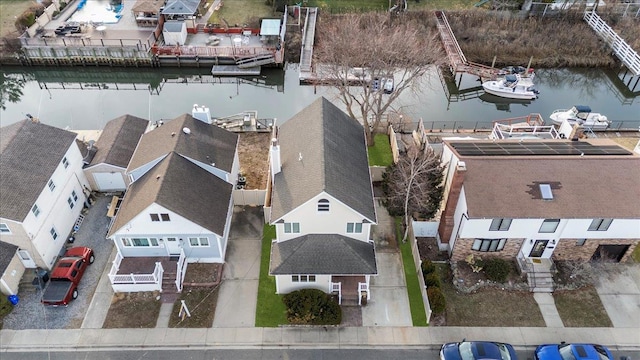 drone / aerial view featuring a water view