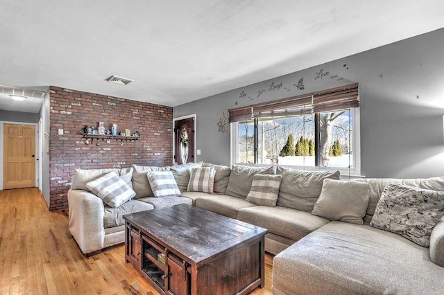 living room with light hardwood / wood-style floors