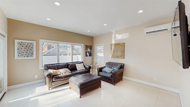 living room featuring an AC wall unit