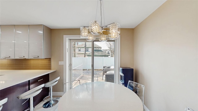 dining room with a notable chandelier