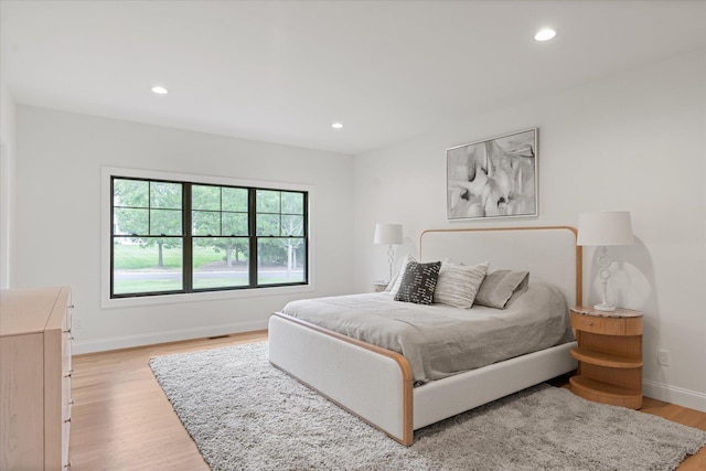 bedroom featuring light wood-type flooring