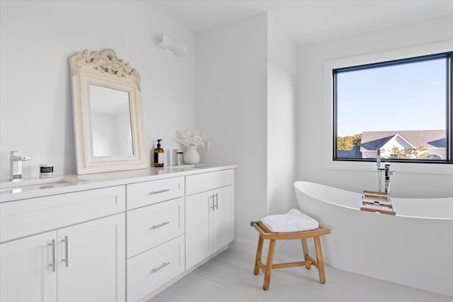 bathroom featuring vanity and a bathtub