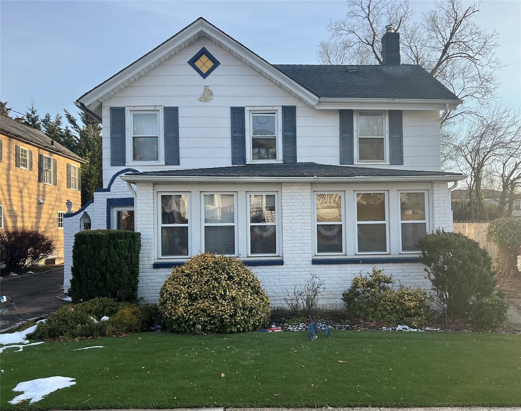 front of property with a front yard