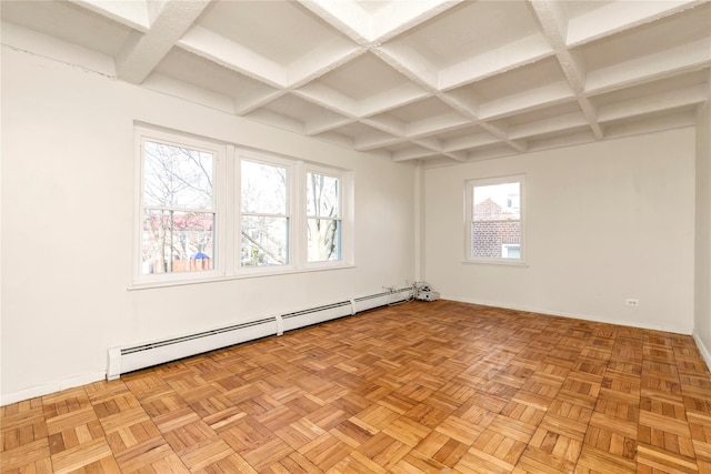 empty room with beam ceiling, coffered ceiling, baseboards, and baseboard heating