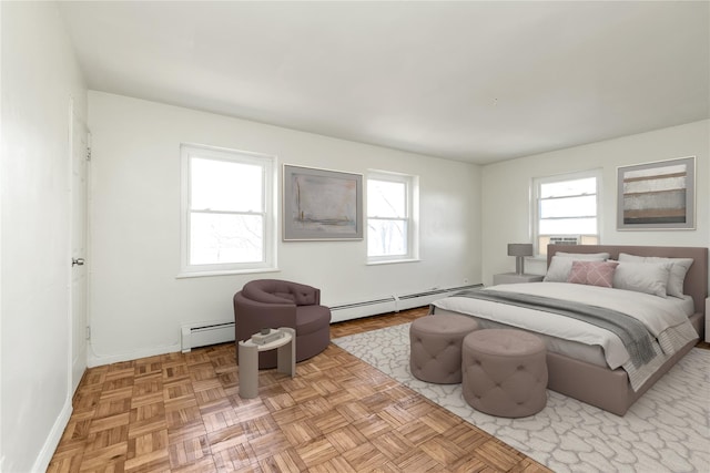 bedroom with baseboards and baseboard heating