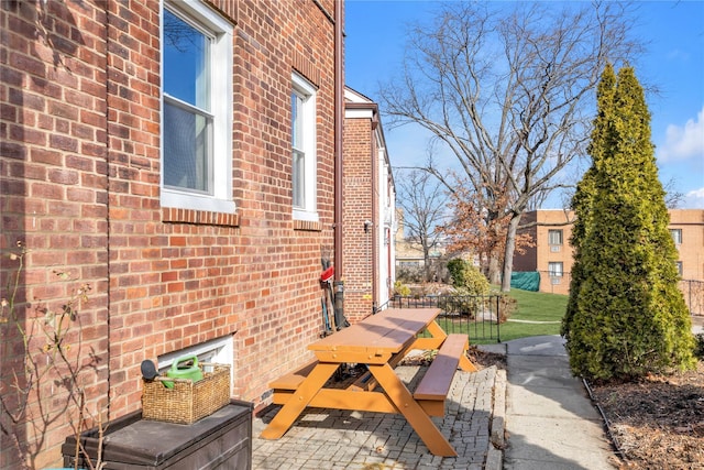 view of patio featuring outdoor dining area